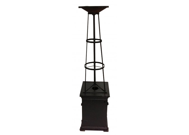 Tall slender porcelain bottle with natural clay textured body and cork stopper.